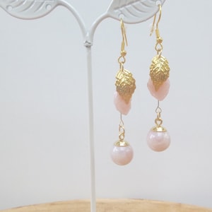 Light earrings model golden leaf and pink sphere
