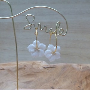 Resin earrings Flower of Sakura , very light , Flowers mounted on Creoles
