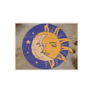 May include: A vintage-style illustration of a sun and moon on a wooden background. The sun and moon are depicted as faces, with the sun's eyes closed and the moon's eyes open. The sun is yellow and the moon is white, with a purple halo around the sun.