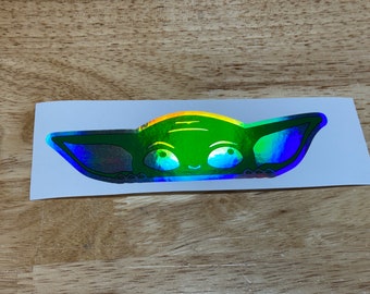 Pick your finish! holographic prismatic brushed grogu peeking over window waterproof logo vinyl sticker! Easy to customize. Fast shipping!