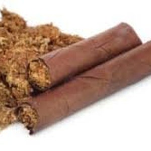 May include: Two brown cigars with a pile of loose brown tobacco.