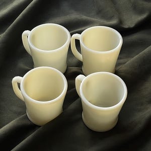 vintage set of ivory fire king coffee mugs | curated démodé