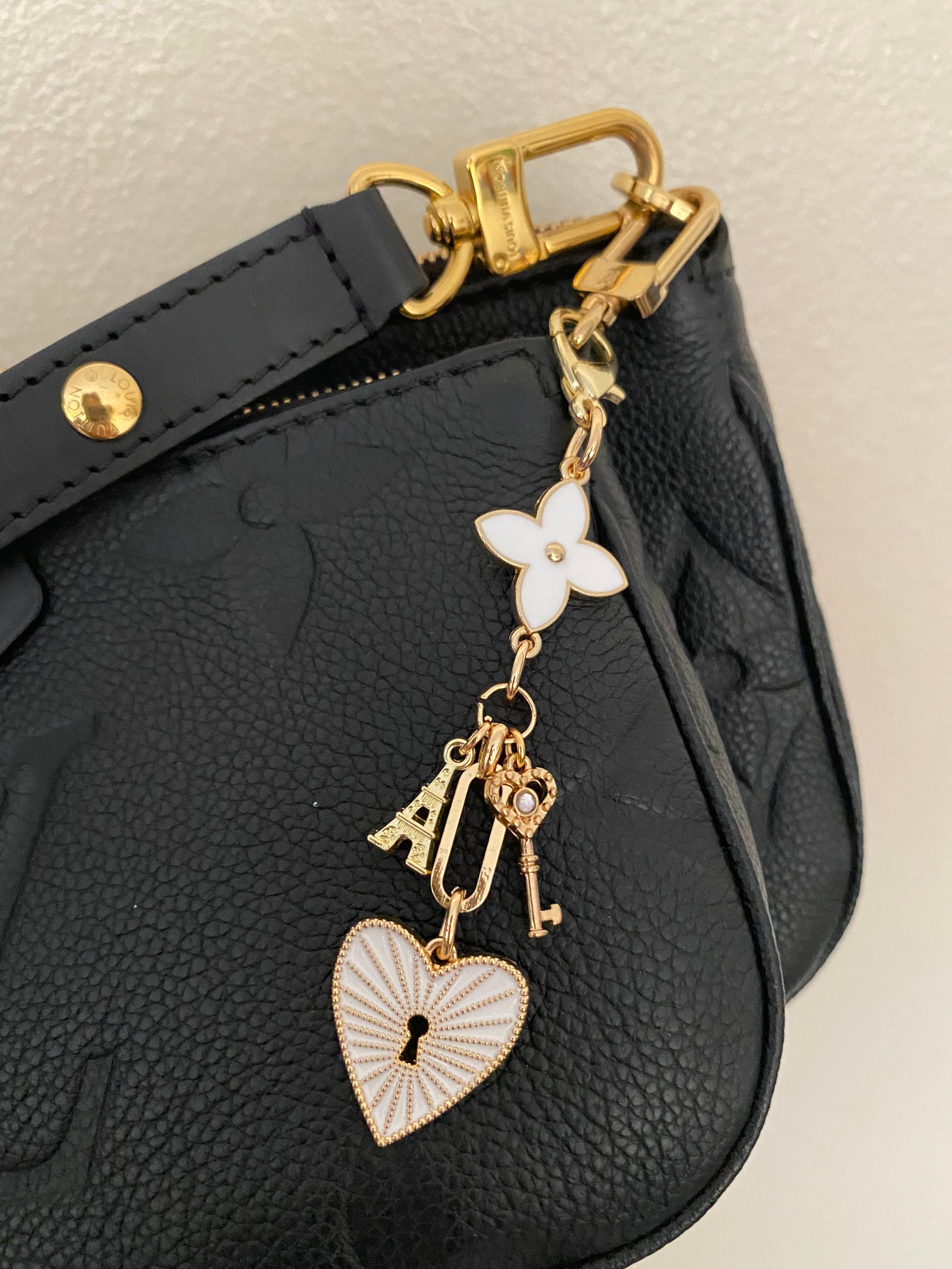 Louis Vuitton Neo Neverfull MM with pink flower bag charm from   ridi…