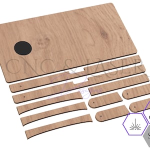 May include: A laser cut wooden desk organiser with a cutout for a phone or tablet. The organiser is made up of several pieces that are assembled together. The pieces are labelled with the text "CNC & LASER".