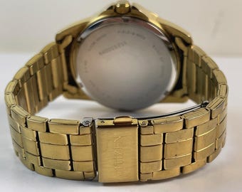 Citizen Multifunction Gold Tone Black Textured Dial Ref. 6329