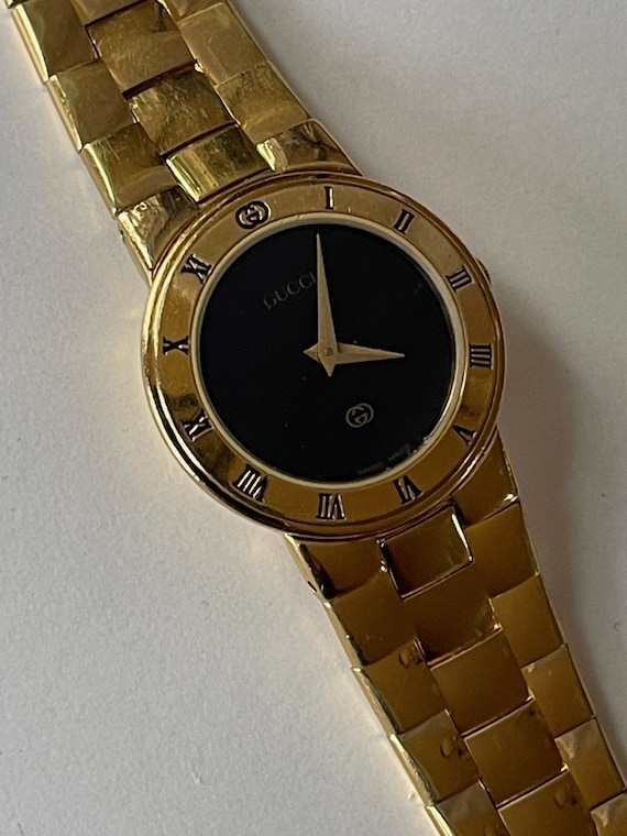 Gucci Ladies Gold Capped Black Dial Vintage Swiss 