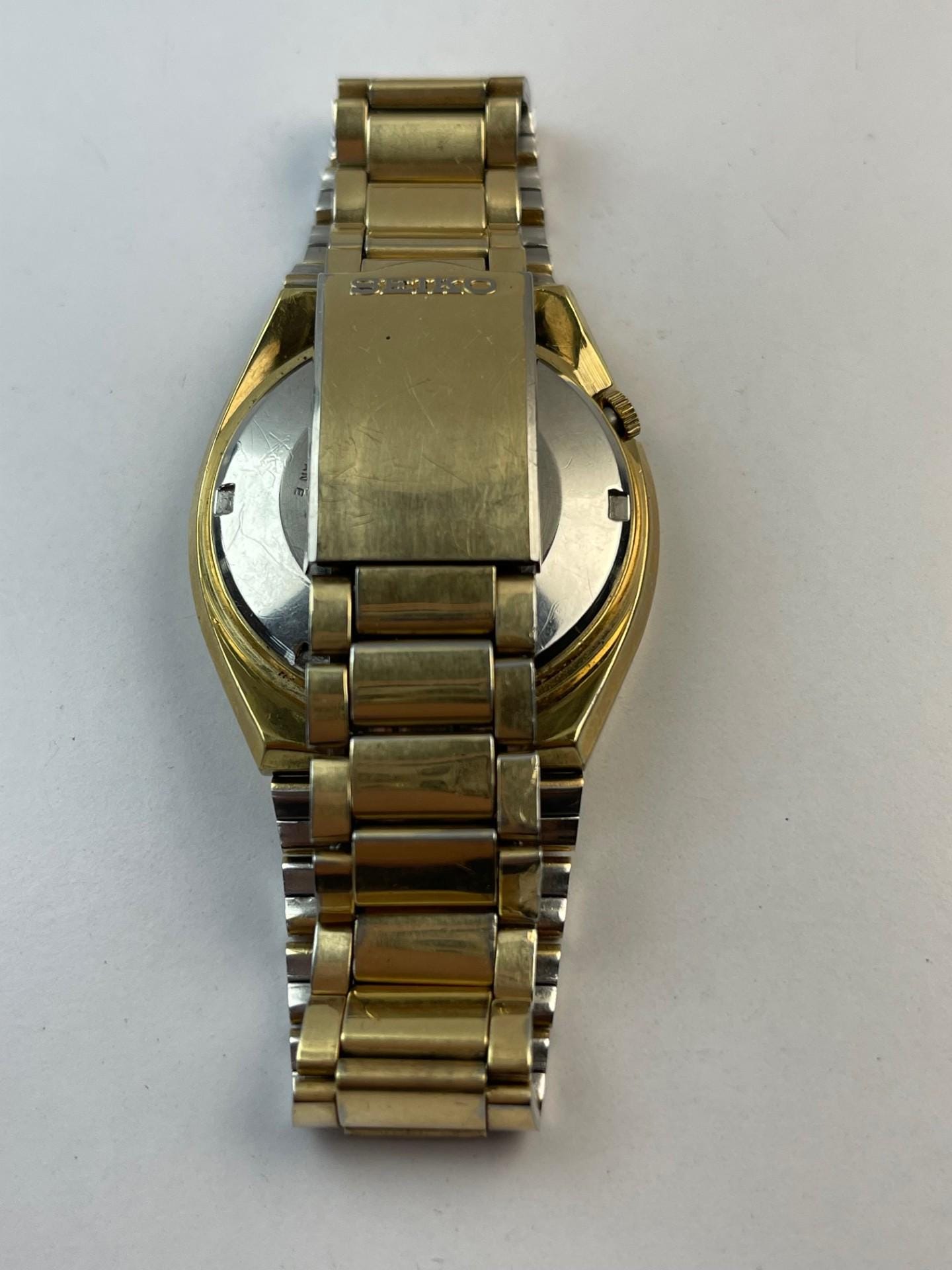 Seiko Automatic DX Calendar Day/date Sunburst Dial Ref. 6106-7619