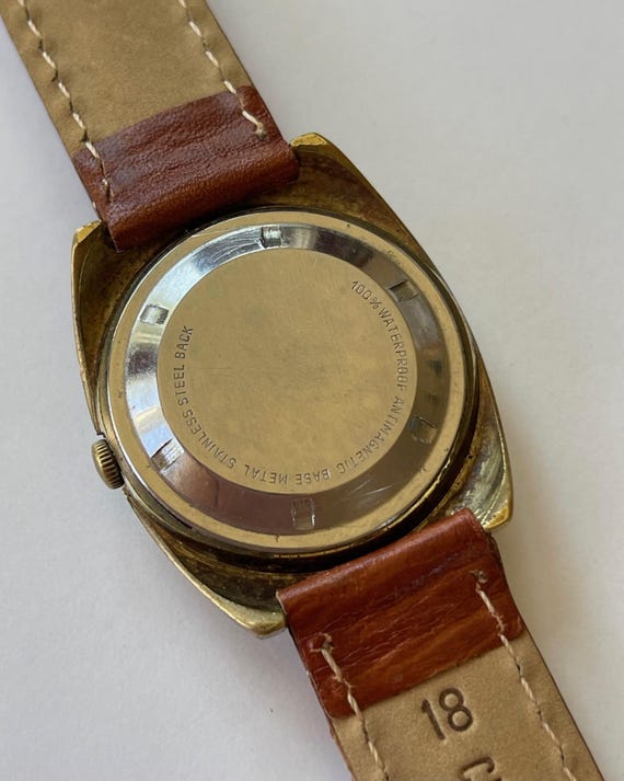 Clinton Automatic Calendar Day/date 25 Jewels Gold Capped Screw