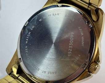 Citizen Multifunction Gold Tone Black Textured Dial Ref. 6329