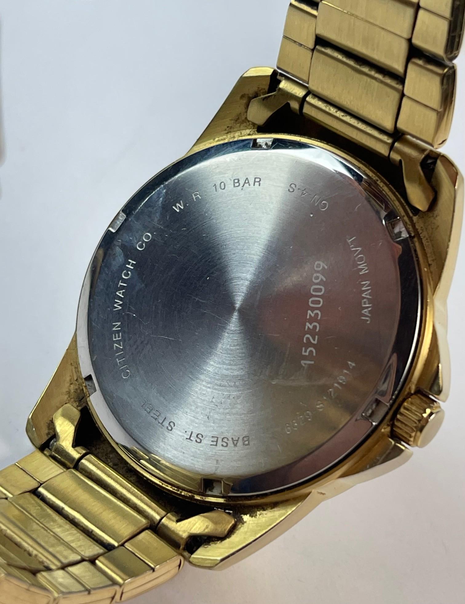 Citizen Multifunction Gold Tone Black Textured Dial Ref. 6329