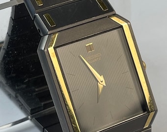 Seiko Dress Ref.7430-5479 Black Coated / Stainless Steel Back Two Tone Ultra Thin Rectangular Vintage Made in Japan 1984