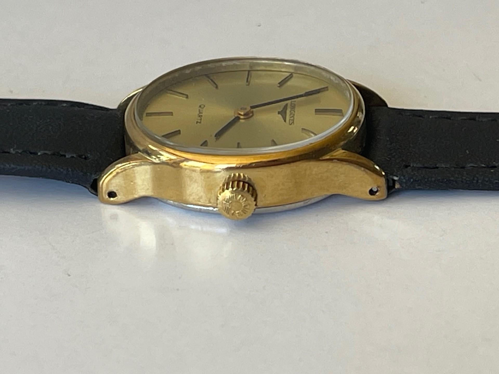ロンジン レディース オーバル ゴールドキャップ Ref.700-167