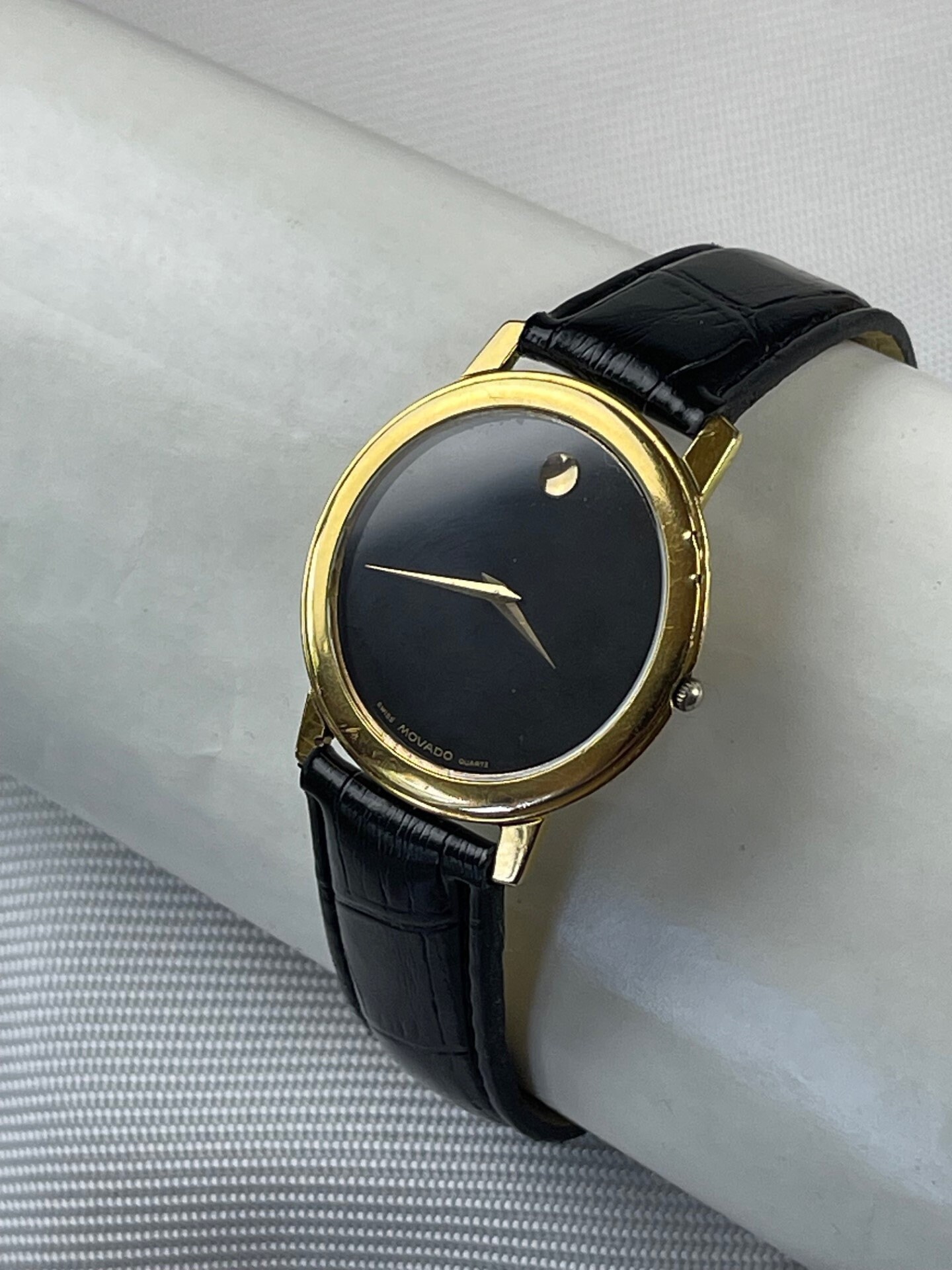 Movado black cheap and gold