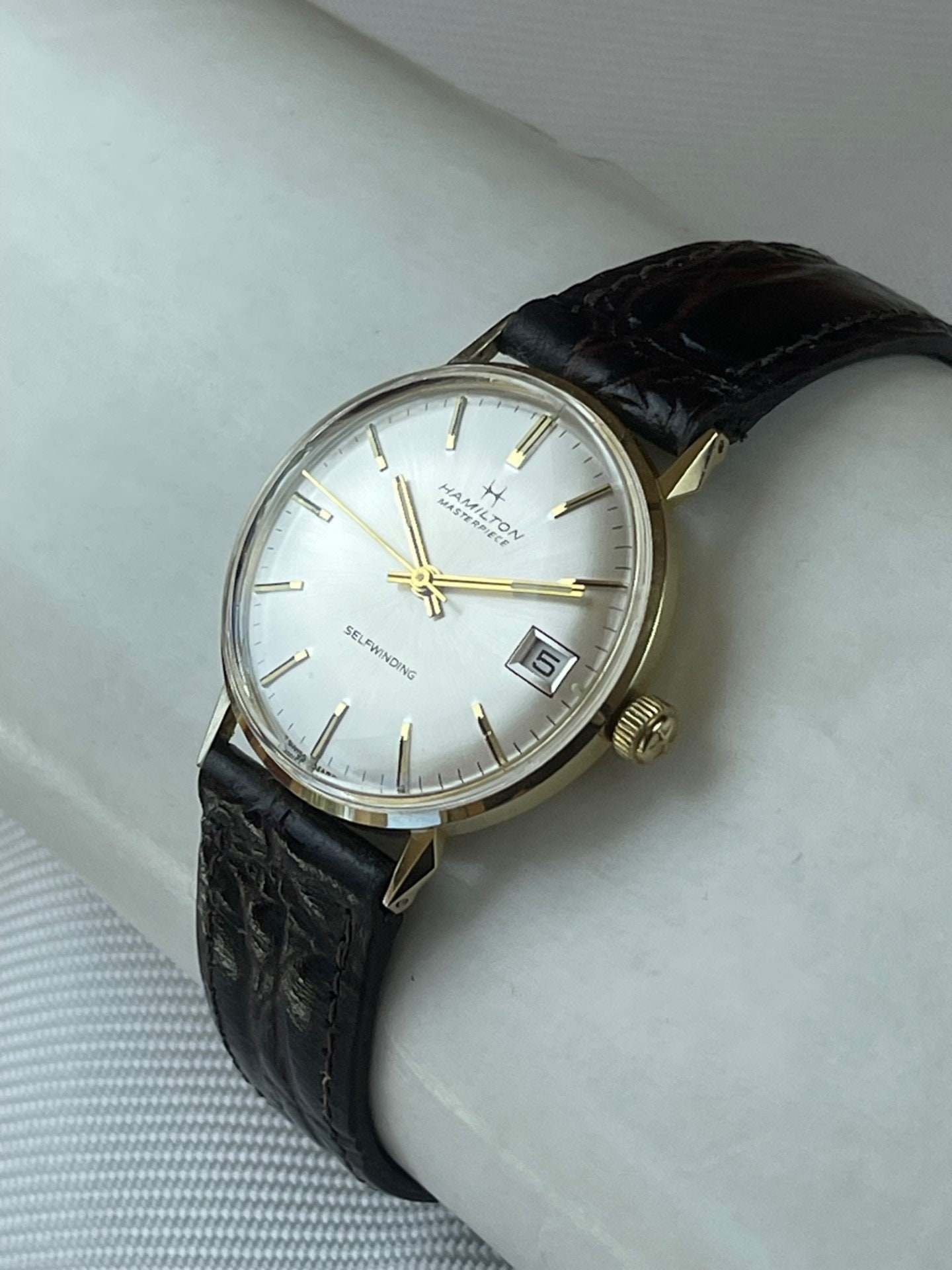 Hamilton masterpiece 2025 watch value