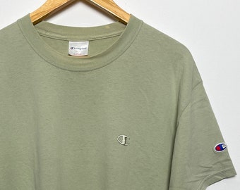 Maglietta beige con logo Champion C vintage degli anni '90 (taglia adulto grande)