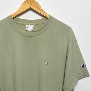 Vintage 1990s Champion C Logo Beige Tee Shirt (size adult Large)