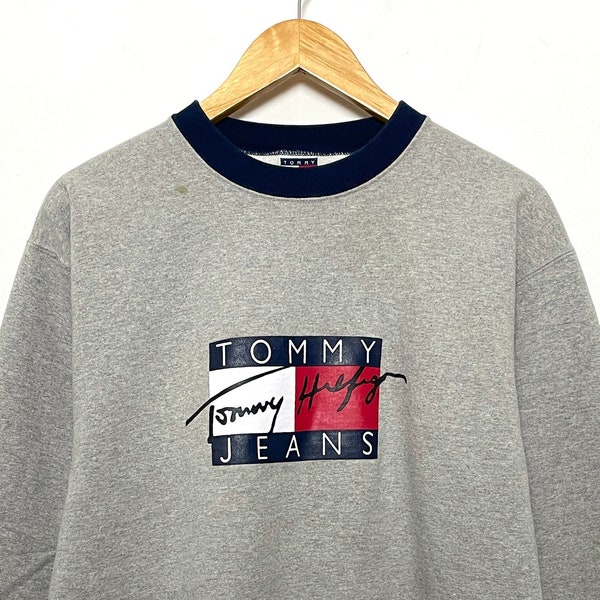 Vintage 1990s Tommy Hilfiger Jeans Spell Out Flag Logo Graphic Ringer Crewneck Sweatshirt (fits adult Medium)