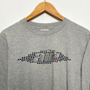 Vintage 1990s Youth Nike Air Mini Swoosh Logo Spell Out Graphic Long Sleeve Tee Shirt (size youth Large)
