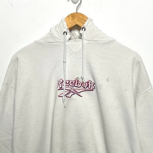 Vintage 1990s Reebok Delta Logo White Pullover Hoodie Sweatshirt (size adult Small)