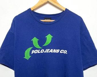 Vintage 1990s Polo Jeans Company de Ralph Lauren Spell Out Arrow Graphic Camiseta (tamaño adulto XL)