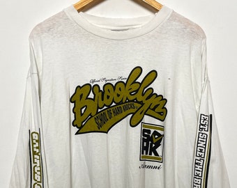 Vintage 1990s School of Hard Knocks Campus Collection Brooklyn New York Alumni Spell Out made in USA Graphic Long Sleeve Tee Shirt (size XL)