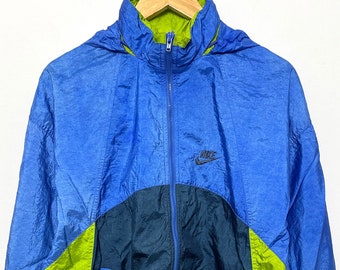 Vintage 1990s Nike Spell Out Swoosh Logo Multi Color Zip Up Windbreaker Jacket (size adult Large)