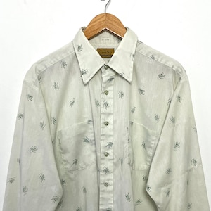Vintage 1970 Jon Maurice para Essley hecho en EE.UU. Camisa de patrón geométrico de manga larga con botones (talla adulto XL)
