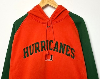 Vintage 1990s Nike Miami Hurricanes Center Mini Swoosh Spell Out Logo Pullover Hoodie Sweatshirt (size adult XL)