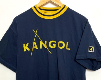Vintage Y2K Kangol Headwear Britain Embroidered Spell Out Graphic Blue and Yellow Ringer Tee Shirt (size adult Large)