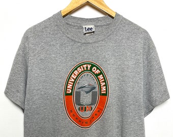 Vintage 1990s University of Miami Hurricanes Athletics Sebastian the Ibis Graphic College Tee Shirt (size adult Large)