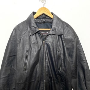 vintage années 1990 Wilson « The Leather Experts » Zip Up Elongated Black Leather Jacket (taille adulte Medium)