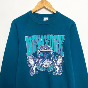 Vintage 1980s New York City Spell Out Lion Crest Skyline Graphic made in USA Crewneck Sweatshirt (fits adult Small)
