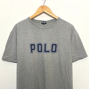 Vintage 1990s Polo by Ralph Lauren Spell Out Logo Graphic Tee Shirt (size adult Large)