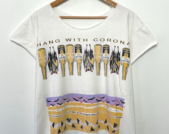 Camiseta vintage de los años 90 de Corona Cerveza con estampado de murciélago y la frase "Hang With Corona" (talla L de adulto)