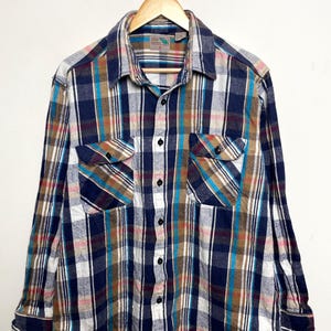 Vintage 1990s Pine Grove Grove Cotton Button Up Long Sleeve Blue Plaid Flannel Shirt (size adult XL)