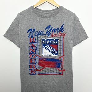Vintage 1990s New York Rangers NHL Hockey Spell Out Graphic Tee Shirt (size adult Medium)