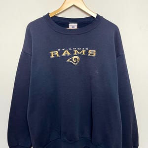 1990年代のヴィンテージ セントルイス・ラムズ NFL フットボール スペルアウト グラフィック クルーネック スウェットシャツ (大人用 L サイズ)