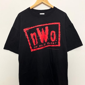 Vintage 1998 New World Order NWO World Championship Wrestling WCW “Bad Has Arrived” Black and Red Graphic Tee Shirt (size adult XL)