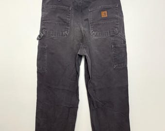 Pantalones de trabajo Carhartt vintage en azul descolorido (talla 34)