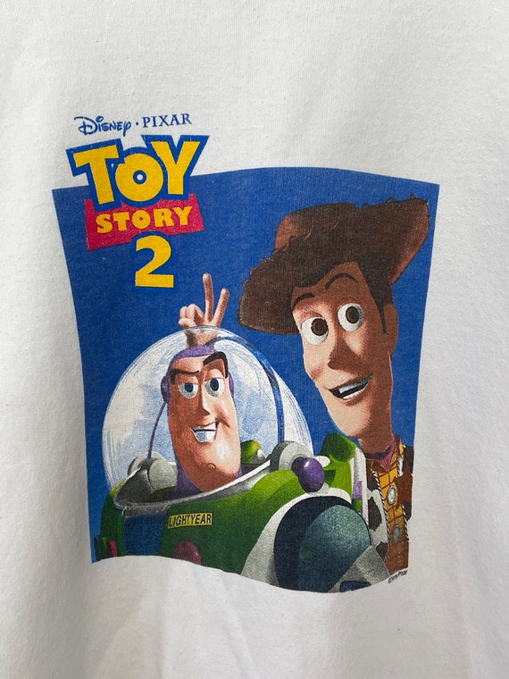 Vintage 1999 Toy Story 2 Disney Graphic Promotional Crewneck Vintage 1999 Toy Story 2 Disney Graphic Promotional Crewneck