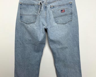 Vintage 1990s Polo Jeans Co by Ralph Lauren USA Flag Logo Distressed Blue Jeans (fit size 33)