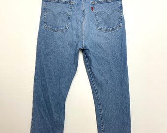Vintage Levi’s 501 Button Fly Blue Denim Jeans (size 28)