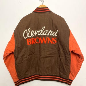 Vintage 1990s Mirage Cleveland Browns 1964 NFL Champions Pinstriped Reversible Graphic Bomber Jacket (size adult Large)