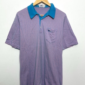 Vintage 1980s Izod Lacoste Alliagtor Logo Blue and White Striped Pocket Polo Shirt (fits adult Medium)
