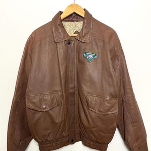 Vintage 1990s North American Fishing Club Life Member Genuine Brown Leather Aviator Bomber Jacket (size adult Large)