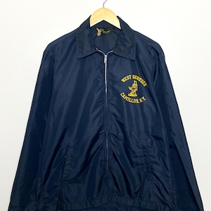 Vintage 1960s Champion Running Man West Genesee Wildcats Camillus New York Navy Blue Zip Up Windbreaker Coach’s Jacket (size adult Medium)