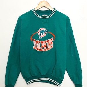 Sudadera vintage de cuello redondo con estampado de los Miami Dolphins de la NFL, años 90, fabricada en EE. UU. (talla pequeña para adulto)