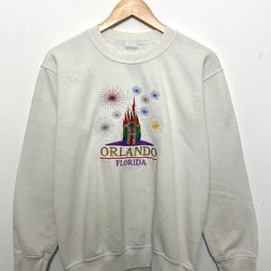 Vintage 1990s Orlando Florida Embroidered Castle Fiework Graphic Crewneck Sweatshirt (size adult Small)