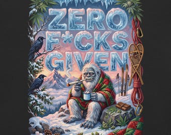 May include: A graphic print featuring a white yeti sitting in a snowy mountain landscape, wrapped in a red and green plaid blanket, holding a mug and a smoking cigar. The text ZERO F*CKS GIVEN is displayed in icy blue letters above.