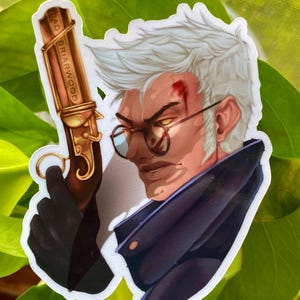 May include: A sticker featuring a white-haired man with a bloody nose, wearing glasses and a dark jacket. He is holding a gold-colored pistol with the inscription "EAD BRIARWOOD".